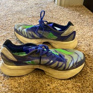 Bouncy and great running shoes, not a good fit for my wider toes.